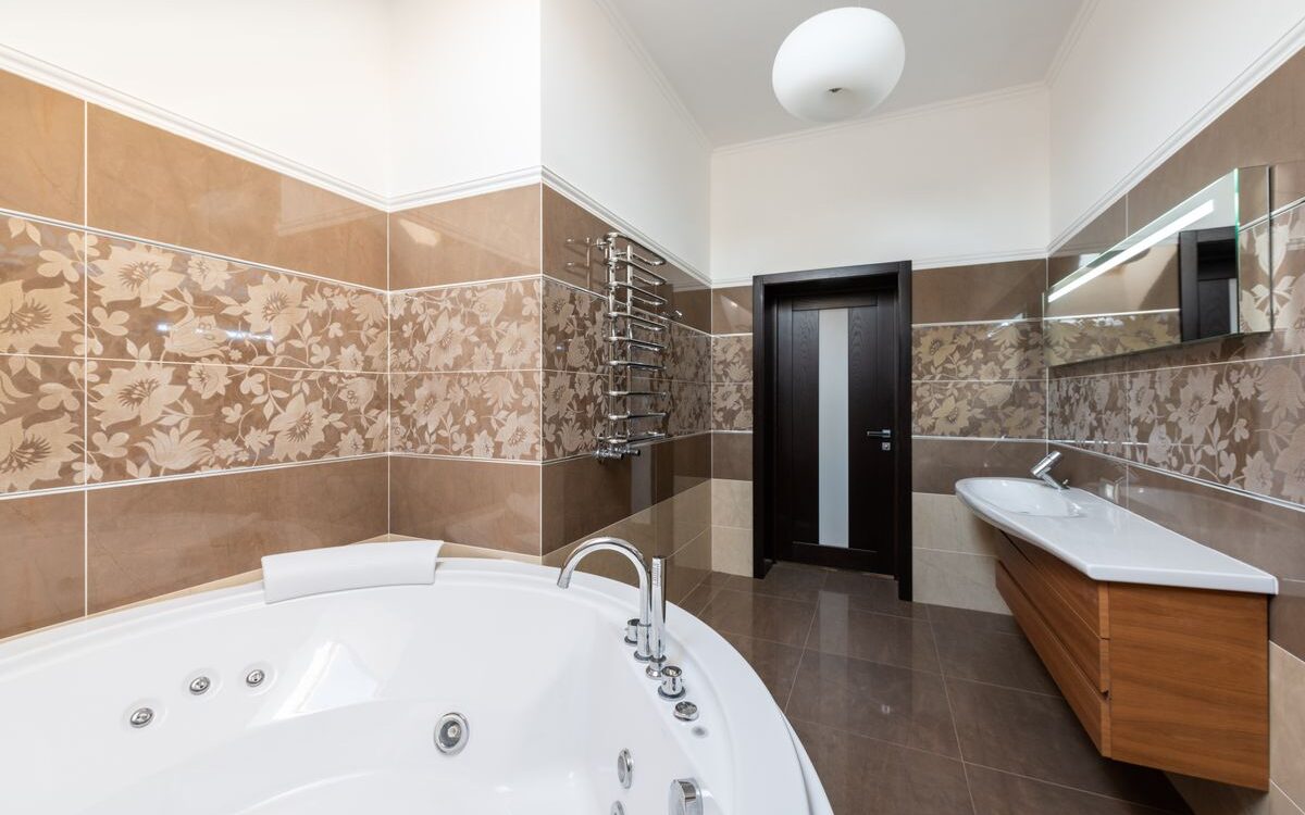 Modern bathroom with a new toilet suite and vanity
