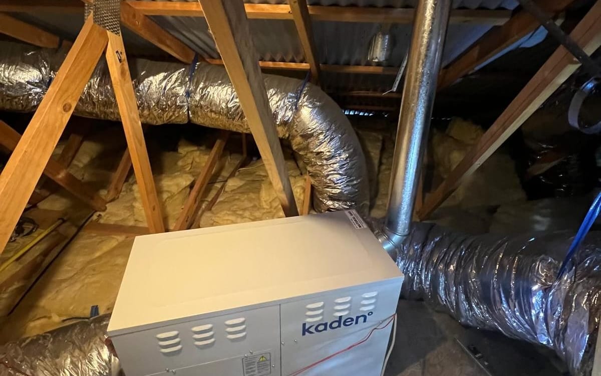 Ducted gas heating unit installed in a roof space