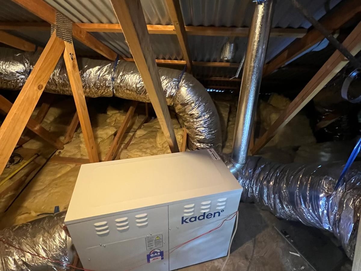 Ducted gas heater installed in a roof space