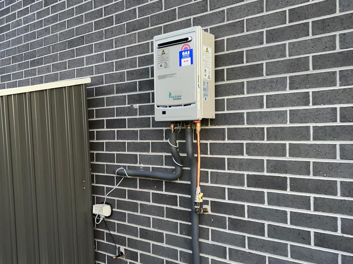Hot water unit and pipework from the side
