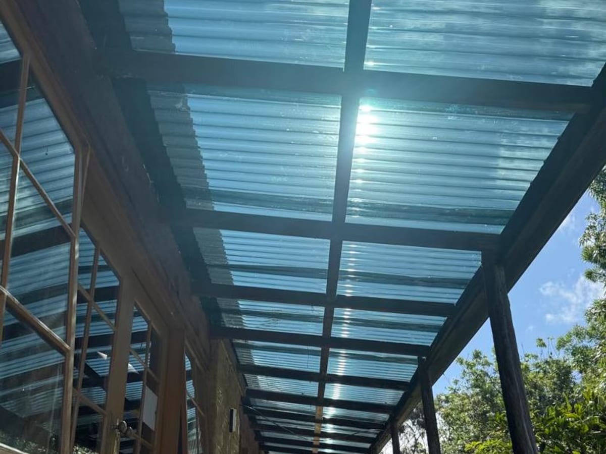 Covered walkway roofing with clear sheeting